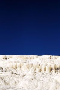 Scenic view of pamukkale against clear sky