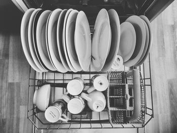 High angle view of utensils in dishwasher