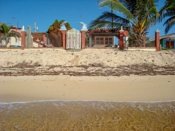 Scenic view of beach against clear sky