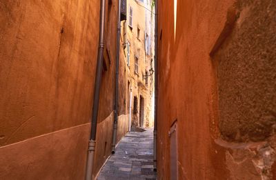 Narrow alley amidst buildings