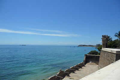 Scenic view of sea against blue sky