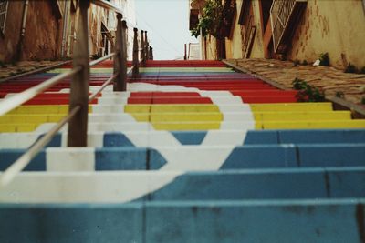 Shadow of railing on footpath