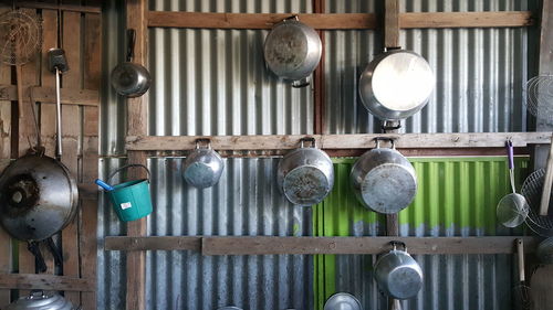 Close-up of kitchen utensil hanging on wall