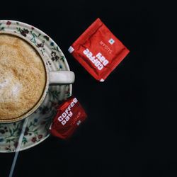 High angle view of coffee on table against black background