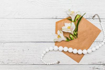Directly above shot of white flower on table