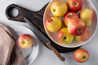 High angle view of apples in bowl on table