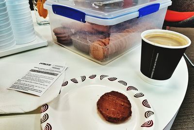 Close-up of coffee cup on table