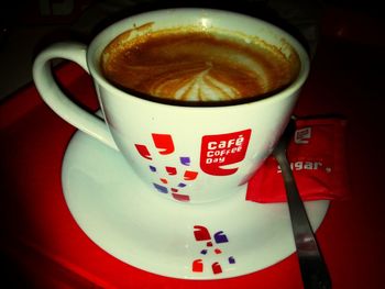 Close-up of coffee cup on table