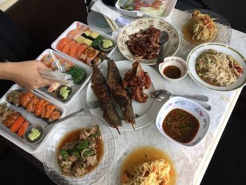 High angle view of person preparing food on table