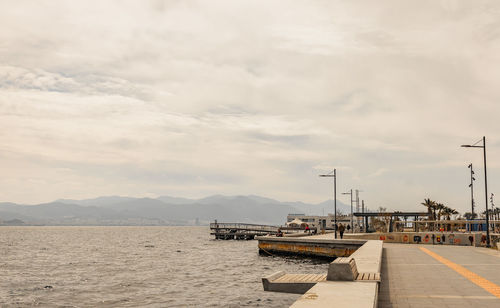 Pier over sea against sky