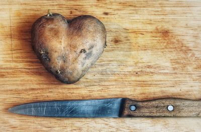 Directly above shot of heart shape on cutting board