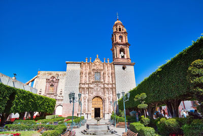 View of historical building against blue sky