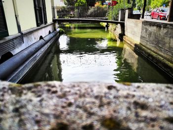 Canal amidst buildings