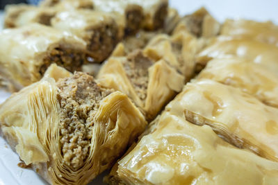 Close-up of middle eastern baklava dessert pieces on plate