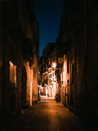 Illuminated street at night