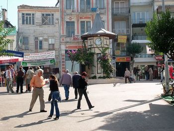 People walking on city street