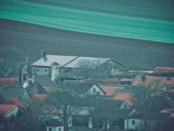 High angle view of houses and buildings in city