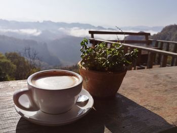 Close-up of coffee cup on table