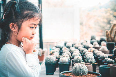 Side view of girl holding ice cream