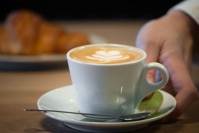 Coffee cup on table