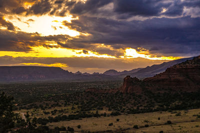 Scenic view of landscape against sky during sunset