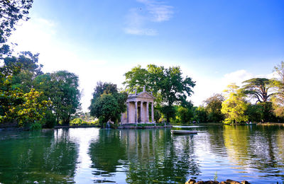 Lake with buildings in background