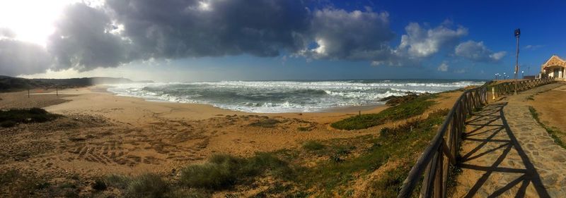 Panoramic view of beach against sky