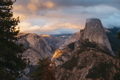 Half dome with dramatic sky and clouds