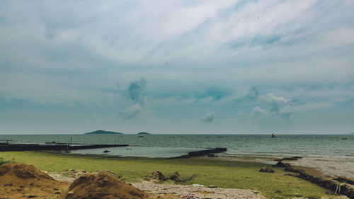 Scenic view of beach against sky