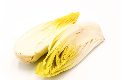 High angle view of bread against white background