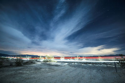 Light trails on country road at night