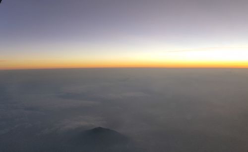 Scenic view of cloudscape against sky during sunset