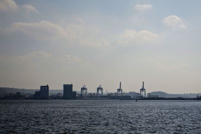 Panoramic view of buildings against sky during sunset