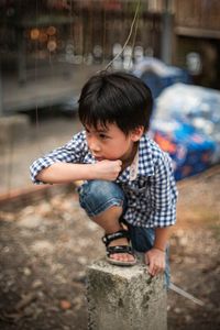 Cute boy looking at camera