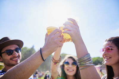 Group of people at party during sunny day