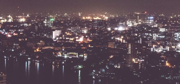 Illuminated cityscape at night