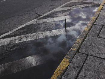 High angle view of puddle on river against sky