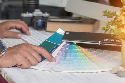 Close-up of man working on table