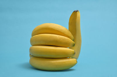 Close-up of bananas against blue background
