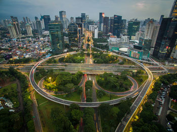 High angle view of street amidst buildings in city