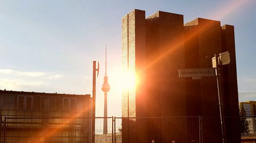 View of skyscrapers against sky during sunset