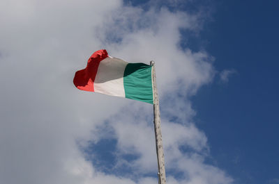 Low angle view of flag against sky