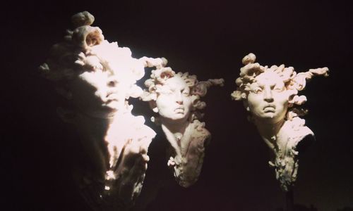Close-up of light painting against black background