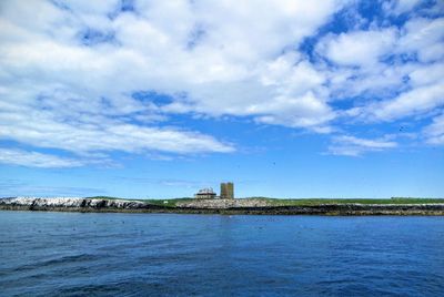 Lighthouse on farne island against sky