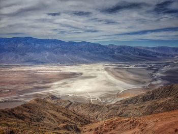 Death valley - aerial view of landscape against cloudy sky