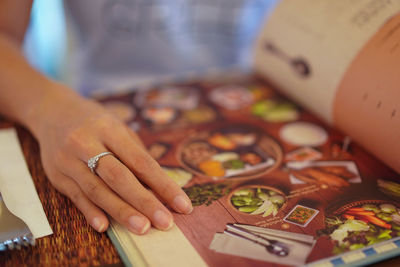 Midsection of woman preparing food