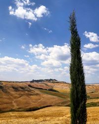 Scenic view of land against sky