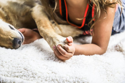 Midsection of woman with dog