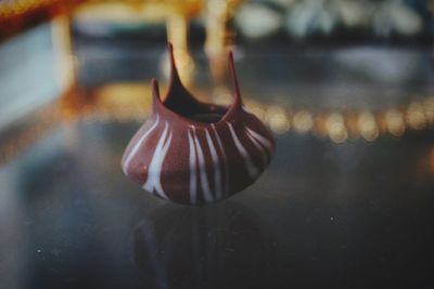 Close-up of glass hanging on table