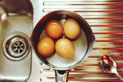 Directly above shot of eggs in cooking pan